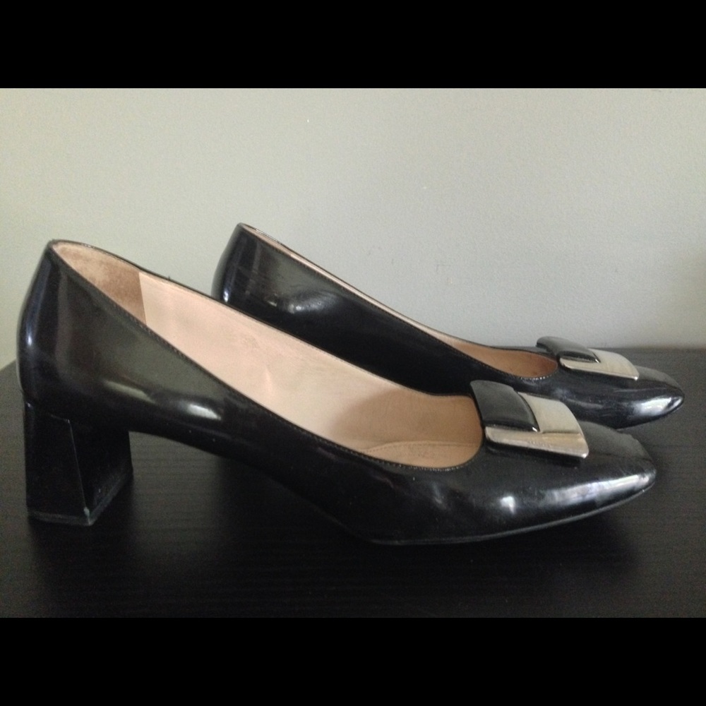 Black patent leather Prada pumps w/ silver buckle